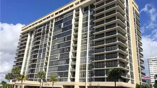 A large building with many windows and balconies.